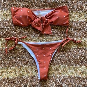 Orange polka dot two piece swimsuit